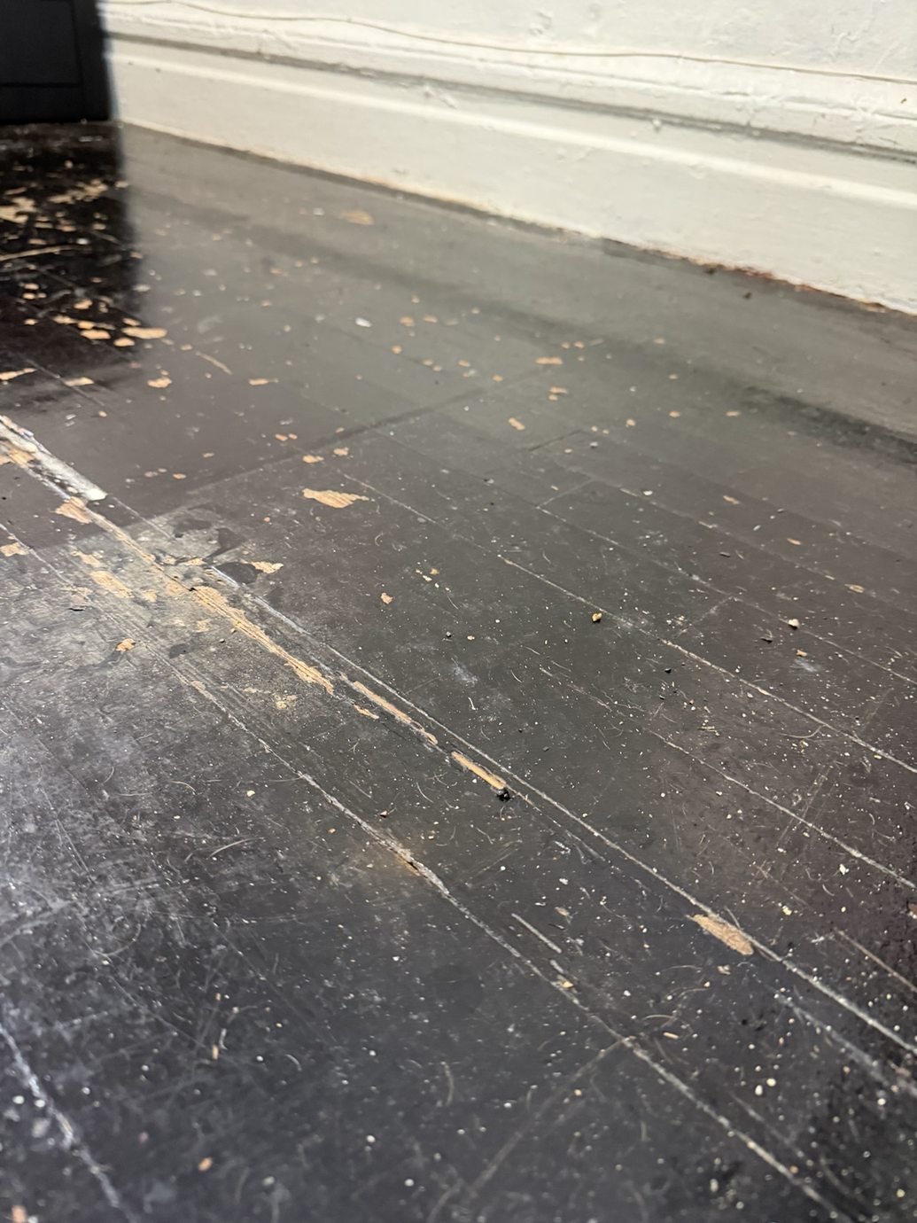 Worn floor joints and marked surface